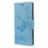Peňaženkové kožené puzdro Butterflies na Xiaomi Redmi Note 10/10S - Modrá