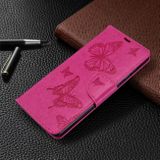 Peňaženkové kožené puzdro Embossing Two Butterflies na Samsung Galaxy A71 - Rose Red