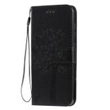 Peňaženkové kožené puzdroTree &amp; Cat Pattern na Samsung Galaxy A51 - Čierna