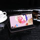 Peňaženkové kožené puzdro na LG K51S - Čierna
