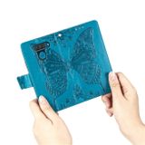 Peňaženkové kožené puzdro na LG Q60 - Modrá